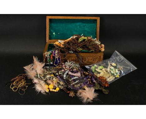 A Large Collection Of Vintage And Contemporary Costume Jewellery Items to include carved wood jewellery box containing a vari