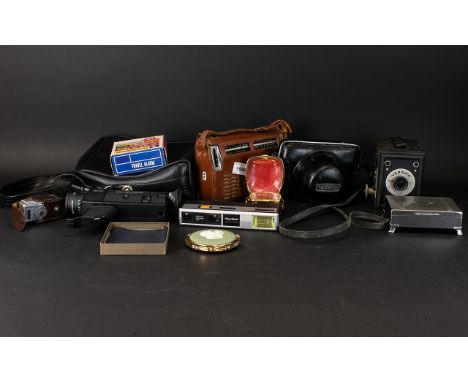 A Collection Of Vintage Cameras And Collectibles Comprising Yashika 45mm camera, Vernax box Brownie, portable radio with orig