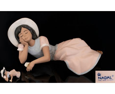 Nadal - Lladro Style Ltd and Numbered Edition Hand Painted Figure - Young girl reclining holding a  flower posy. This Figure 