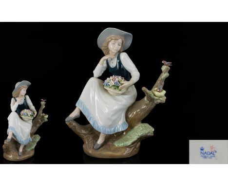Nadal - Lladro Style Hand Painted Porcelain Figure - Young Girl Seated on a Tree Stump with Basket of Flowers, Looking Intent