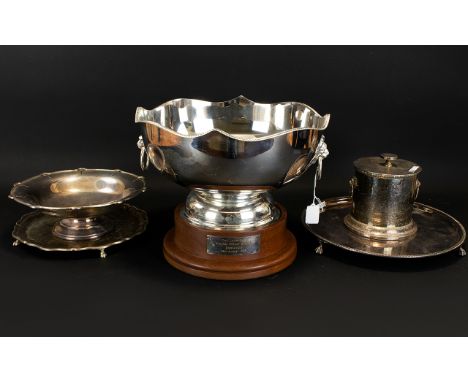 Collection Of Silver Plated Ware, To Include A Large Twin Handled Monteith/Punch Bowl Raised On A Wooden Base, Two Salvers, F