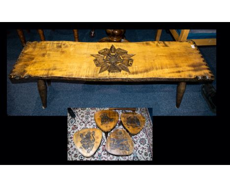 A Low Coffee Table Together With Four Pear Shaped Carved Stools low rectangular coffee table with turned elm supports and car