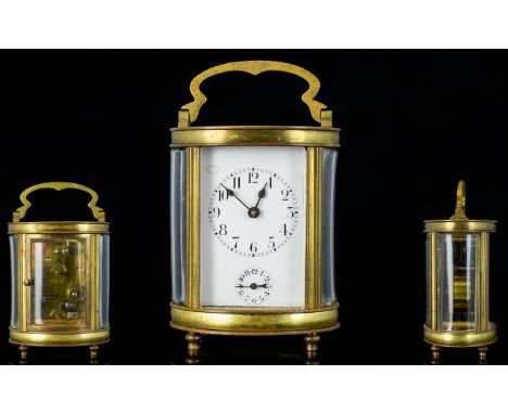 French - Late 19th Century Brass Oval Shaped and Footed Carriage Clock, with Striking and Alarm Functions, Strikes on a Bell,