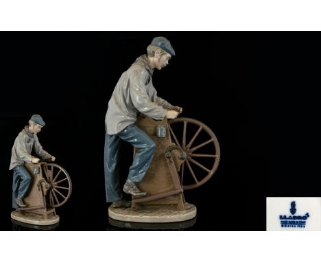 Lladro Porcelain Figure ' Sharpening The Cutlery ' Model No 5204. Issued 1984 - 1987 Retired. Sculptor Salvador Furio. Height