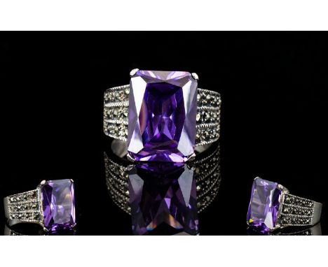 A Sterling Silver Marcasite Set And Lilac Stone Statement Ring Wide band ring set with marcasite chips and large square cut c