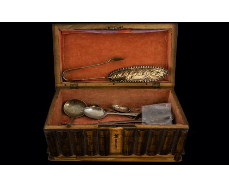 A Wooden Puzzle Box Containing a mixed lot of metalware to include white metal caddy spoon and mixed cutlery 
