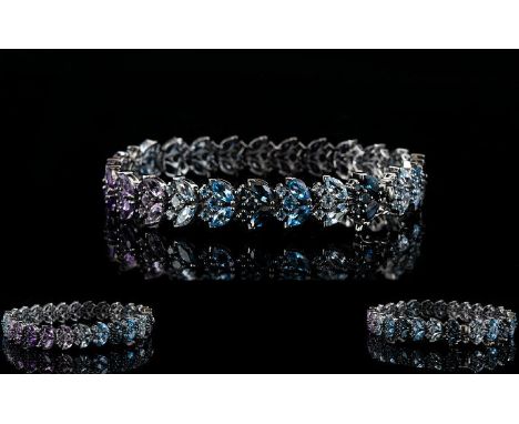 Shades of Blue Topaz and Purple Amethyst Bracelet, a 14.5ct line of clusters in the formation of Sky blue topaz, Swiss blue t
