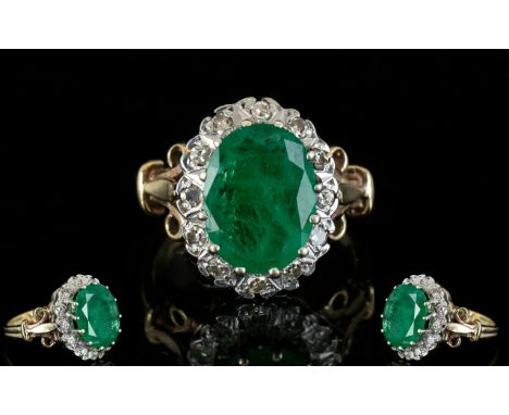 Ladies 9ct Gold Emerald and Diamond Cluster Ring, The Large Central Emerald of Good Colour. Est Size 2.5 cts. Fully Hallmarke