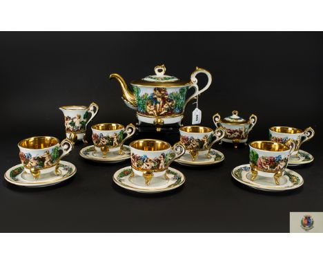 Capodimonte Tea Set comprising tea pot, sugar bowl, 6 cups and saucers and milk jug. Marked GV R. Decorated with elaborate Ch