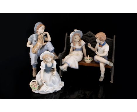 Nadal - Lladro Style Ltd and Numbered Edition Hand Painted Figures (3) in total. Includes Young boy sitting with a dog in lap