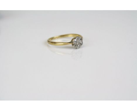 An 18ct yellow gold diamond ring.