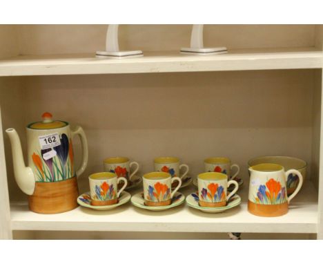 Clarice Cliff Crocus pattern coffee set to include coffee pot, six cups, six saucers, sugar bowl and milk jug (some items rep