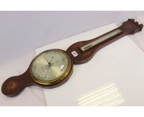 19th century Inlaid Mahogany Wheel Barometer with Thermometer Scale, the silvered face marked ' G B Giobbil &amp; Co, Devizes