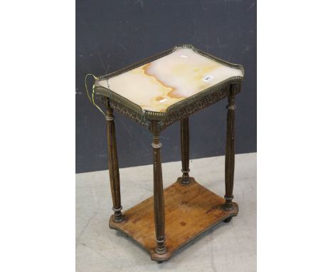 French Lamp Table, the marble top with pierced gilt gallery rail, scrolling metal mounts, turned fluted slender legs, shelf b