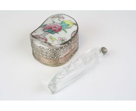 A miniature glass bottle in the form of an ocean liner together with a small trinket box.