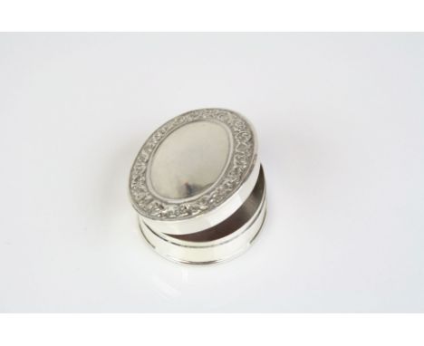 Silver pill box with blank cartouche the interior enamel set in the woodhall style 