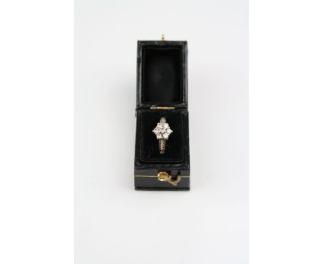 Yellow gold diamond flower head style ring 