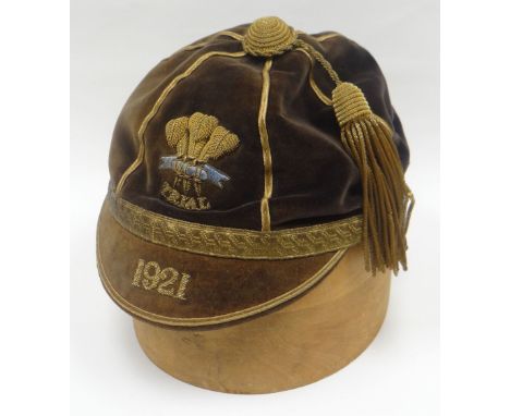 A 1921 Welsh Rugby Union 'TRIAL' cap awarded to Tommy Johnson (see provenance for Lot 1 & 2),  in velvet with gold braiding a