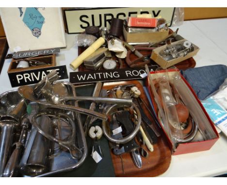 A quantity of loose doctor's surgery examination instruments, sundry surgery door signs and associated medical items (from th