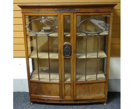 An Edwardian mahogany bow-front two door china-cabinet, circa 1915, 119cms