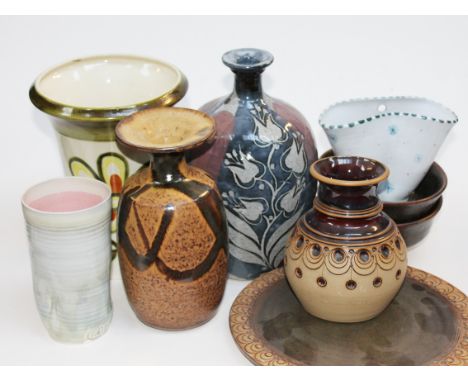 Nine items of studio pottery to include E. Radford and Rye Studio
