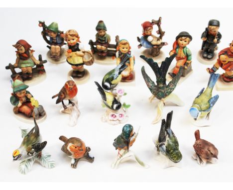 Ten Hummel figures and nine Goebel birds
