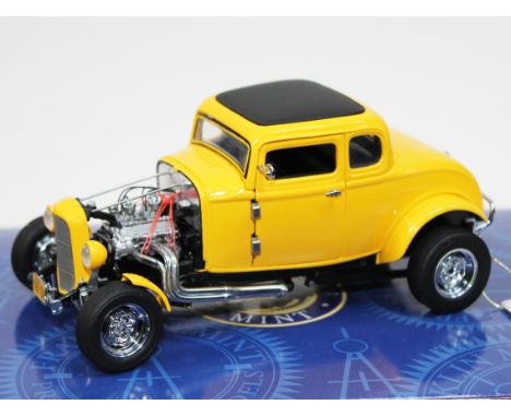 A Franklin Mint model car American Graffiti Deuce Coupe. Boxed with certificate.