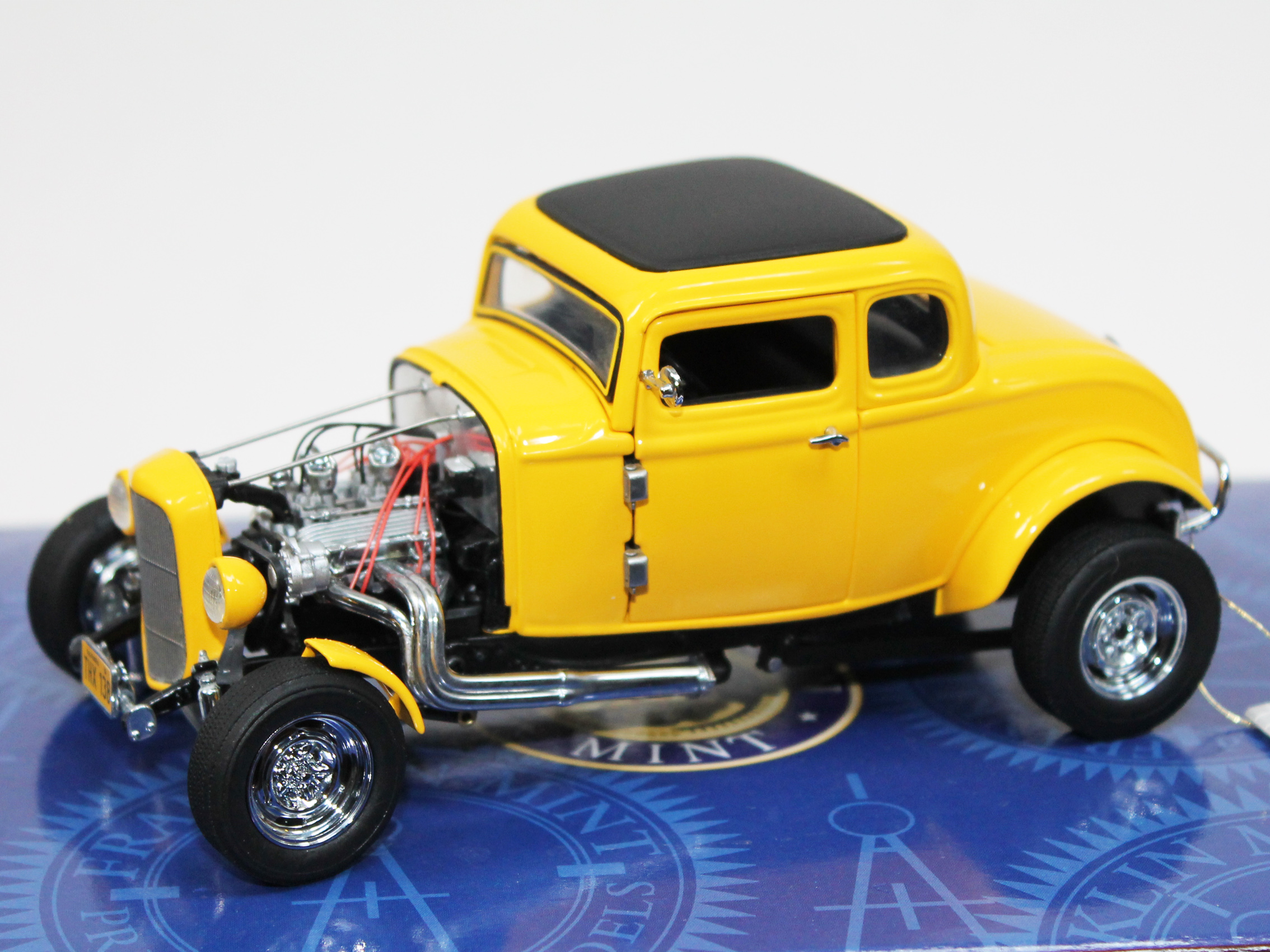 A Franklin Mint Model Car American Graffiti Deuce Coupe. Boxed With 