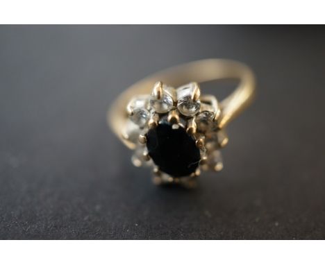 9ct Gold cluster ring with central sapphire Size L 