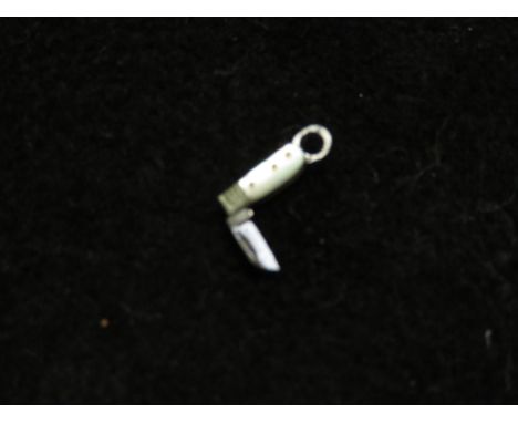 Early 20th century micro folding pen knife with mother of pearl inlay, possibly apprentice piece Length 15 mm (Opened)