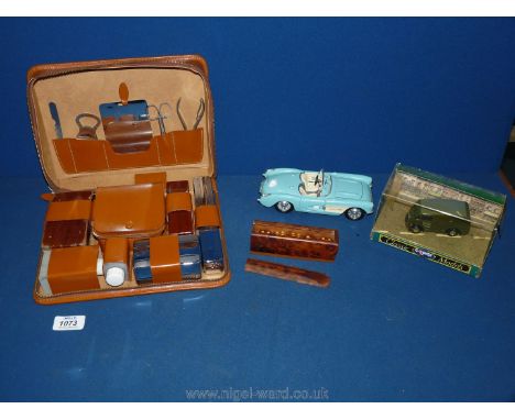A 20th c. Cowhide gentleman's complete Vanity case, a boxed Corgi British Telephone green van, boxed model of and American Ch