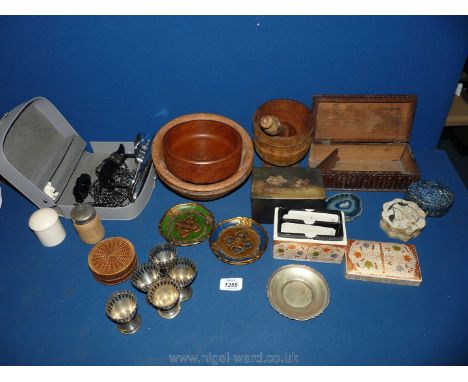 A quantity of Treen to include bowls, a pestle and mortar, wooden box, a travel iron, card box, miscellaneous trinket dishes,