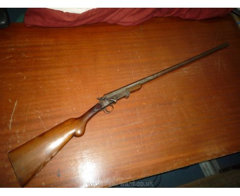 A Belgian Single Barrel, non-ejector, open-hammer, 12 gauge Poacher's-Type folding Shotgun serial no. 3956 having an octagona