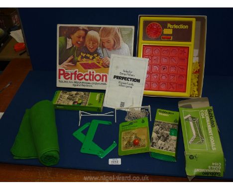 A boxed Deny's Fisher 'Perfection' game complete with contents and a Subbuteo table football game with goals, players, green 