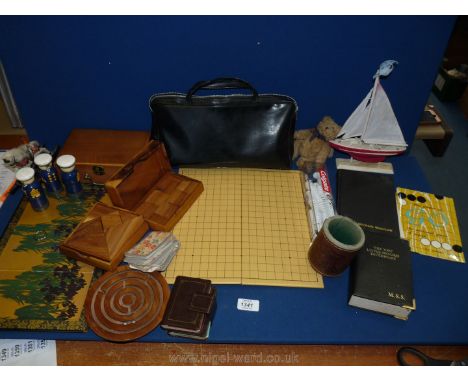 A quantity of wooden games, playing cards etc. including The National Game of Japan 'Go' with rule book, model yacht, little 