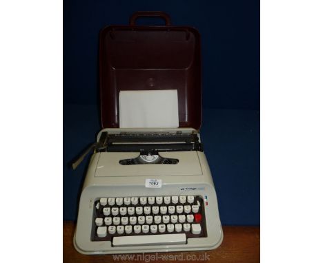 A cased Scheidegger President typewriter.