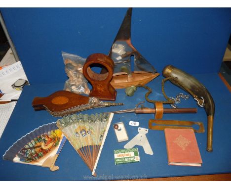 A box of miscellanea to include a horn flask, stainless steel Art Deco model of a sailing boat (with hidden compartment), bel