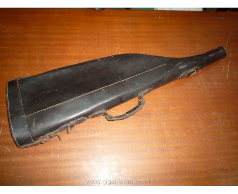A dark brown leather "Leg o' Mutton" gun case, 30 3/4" long overall, will take a gun with barrel length of up to 30 3/8" appr
