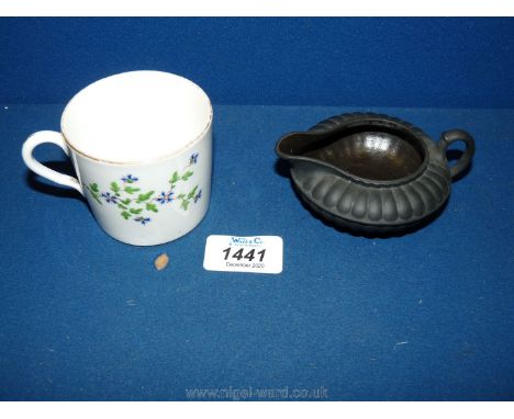 A rare Wedgwood black basalt finely moulded squat shape cream jug, circa 1770, 4" long, plus an 18th c. Caughley coffee can i