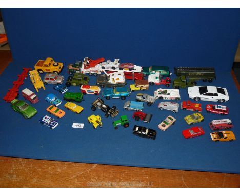 A quantity of Matchbox and Corgi cars, trucks and lorries including a K74 Volvo estate, Ford LTS series tractor 1973 etc.