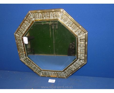 A brass framed octagonal wall Mirror.