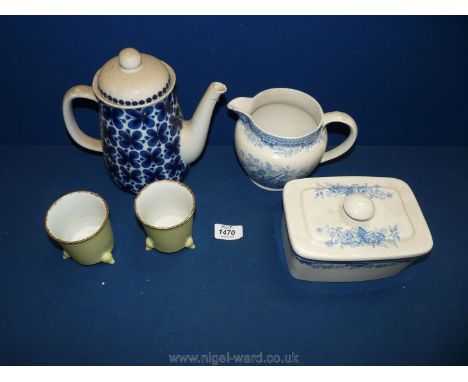 A Burley Staffordshire Davenport milk jug and matching butter dish, two ceramic yellow chocolate cups, and a pottery coffee p