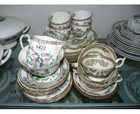 A quantity of Indian Tree saucers, cups, tea plates, milk jug, sugar bowls, three Coalport Indian Tree pattern plates and fou