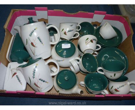 A good quantity of Denby 'Green-wheat' Tea ware including cups, saucers, milk jugs, teapots and hot water pots, butter dish, 