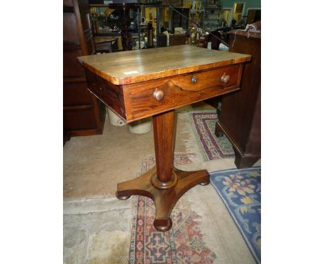 A believed Regency period Rosewood Work Table standing on a tapering octagonal pillar with a platform base raised on compress