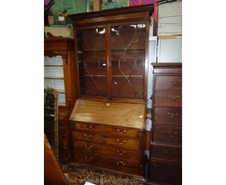 A fine old Mahogany Bureau Bookcase, the pair of bookcase doors having 13-pane glazing and revealing adjustable bookshelves. 