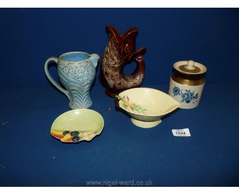 A small quantity of china including brown gurgle jug, Carlton ware dashes, Wade blue jug and lidded pot.