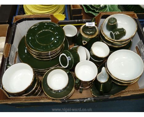 A fifty-five piece Apilco France dinnerware and tea set (in green/gold) to include tea cups, saucers, mugs, soup cups, dinner