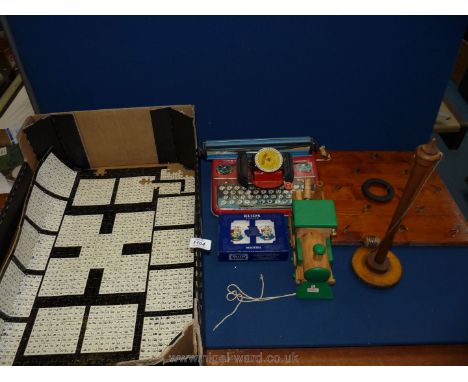 A quantity of games and toys including Reid's Palace cards, wooden 'Choco Train', tin typewriter, The Meltype Junior, quoits 