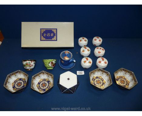 A boxed set of Oriental rice dishes, plus six lipped pots and small blue teapot.